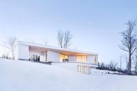 01 All-white from the outside Nook Residence is located in Quebec, Canada