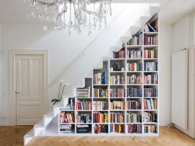 book shelves in the stairs