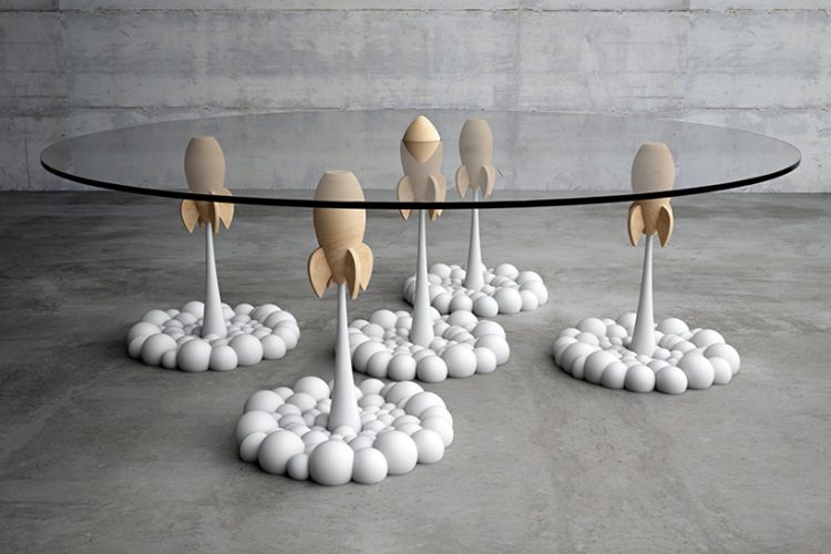 the Rocket table brings fluffy, cartoon-like clouds and aerial rockets from a personal toy collection to life