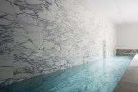 06 luxurious marble clad indoor pool