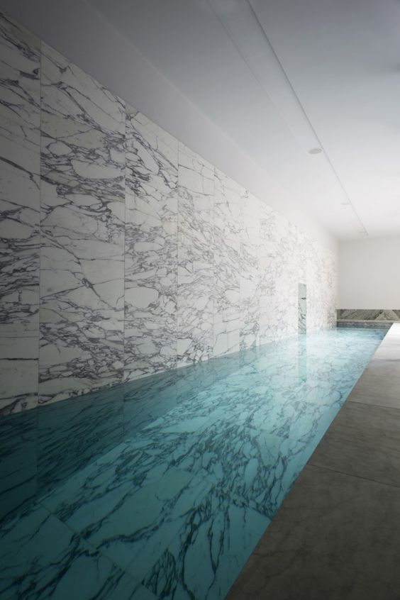 luxurious marble clad indoor pool