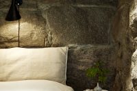 06 rough stone walls in the bedroom