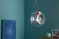 07 Eyes is a hanging glass lamp that resembles an eye with its shape