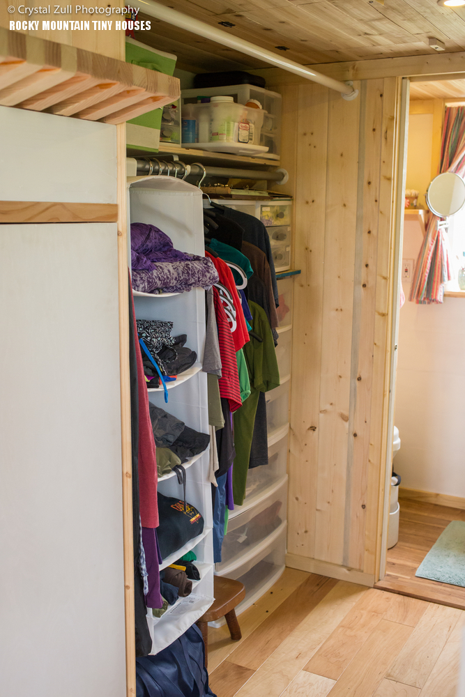 08 There’s a compact walk-in closet with lots of shelves and cubbies