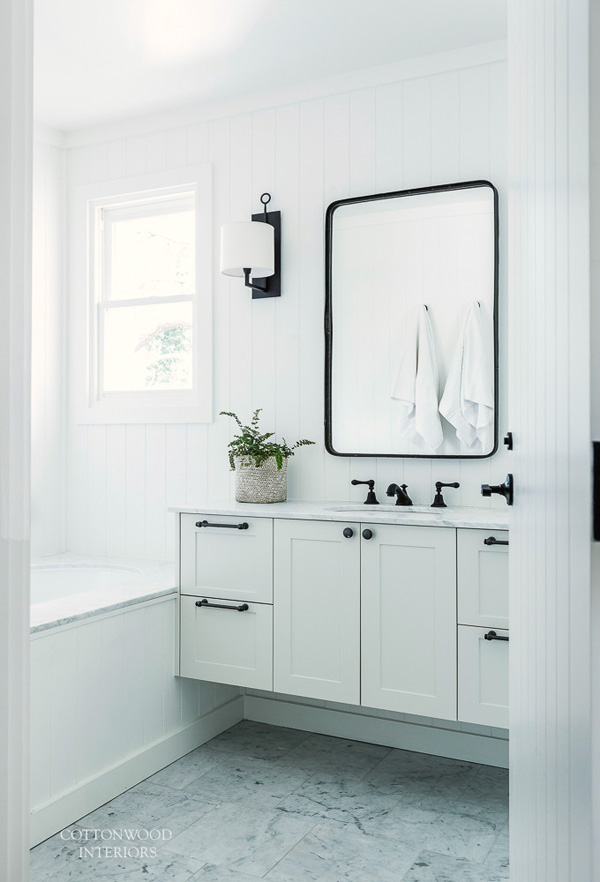 white Scandinavian bathroom with marble surfaces