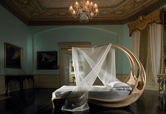 A Bedroom With An Extravagant Canopy Bed (via bornrich)