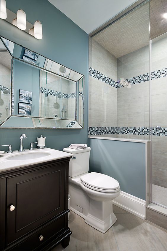 11 blue shades mosaic border tiles in the shower