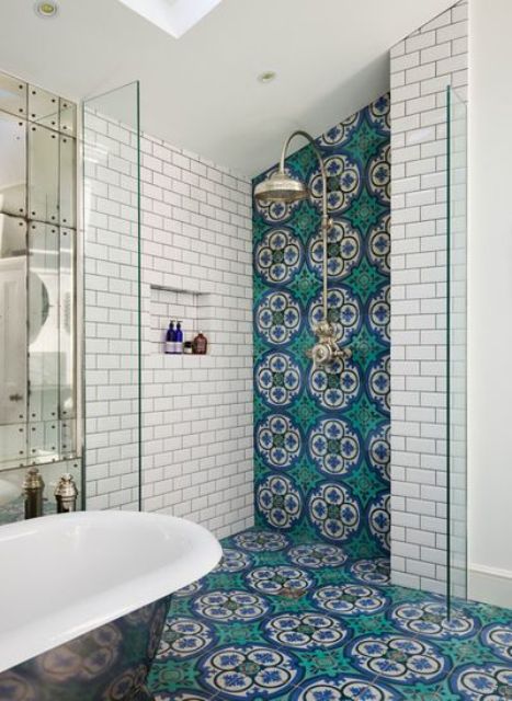 bold mosaic tiles as on the floor as on the shower wall (Drummonds Bathrooms)