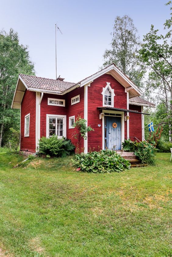 Swedish cottage with a cross gable roof