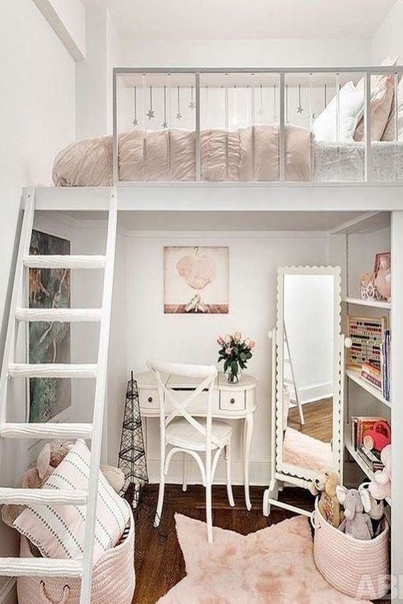 A creative Parisian teen bedroom with a loft bedroom, a tiny desk and a chair, a floor mirror and built in shelves