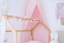 a lovely canopy bed is a perfect addition to a kid’s room