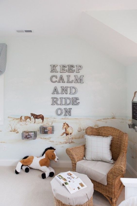 horse farm themed kids' room with an artwork on the wall, toys and wicker furniture feels cozy and relaxed