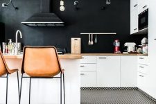 a cozy kitchen design with a chalkboard backsplash