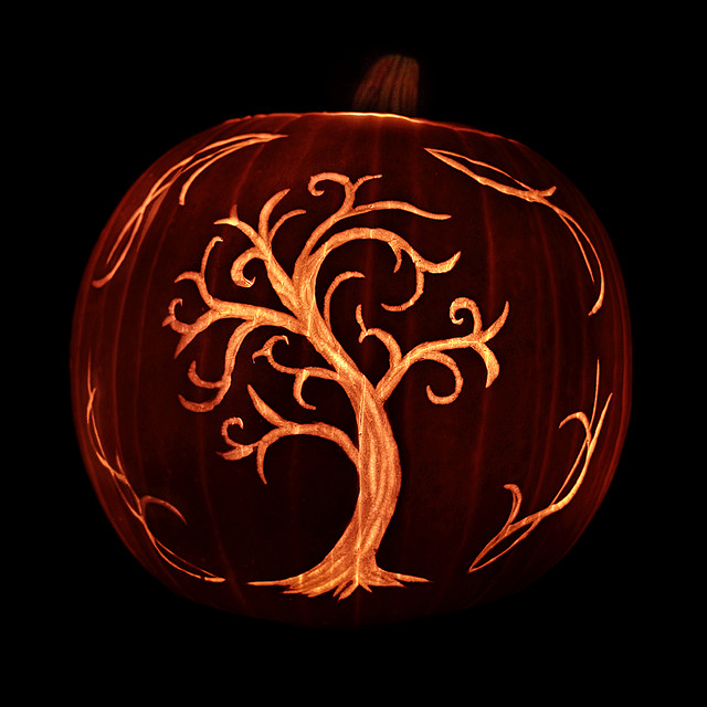Tree carved on a pumpkin isn't spooky but looks great.