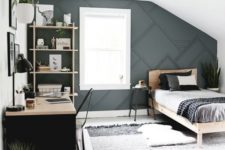a contemporary teen bedroom with a 3D graphic wall, a black desk, a monochromatic rug and wooden furniture