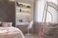 a pastel teen bedroom with a built-in bed, a built-in desk space and a hanging woven chair in the corner