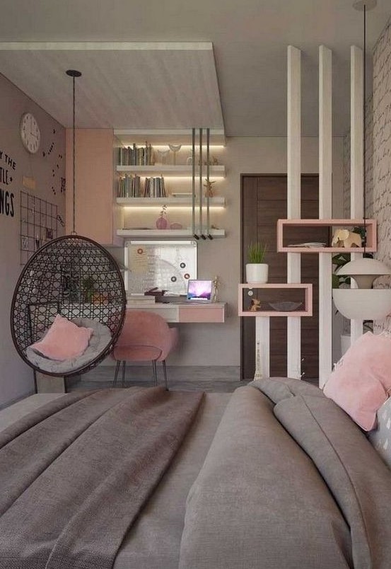 A stylish grey and pink teen girl bedroom with studying and sleeping zones separated with a pendant chair and built in lights