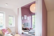 an ultra-modern and bold teen girl bedroom with a purple alcove sleeping space by the window and a white studying zone