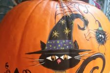 a beautiful painted black cat and spider pumpkin can be made even if you aren’t that good at painting