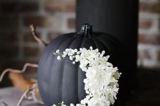 a black pumpkin is an obvious choice for halloween decor