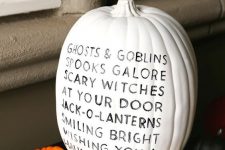 a white pumpkin decorated with a sharpie – with a cute rhyme inspried by Halloween is a simple and lovely idea