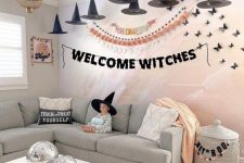 lovely Halloween decor with witches’ hats, bats, butterflies and disco balls is amazing for kids’ and adult parties