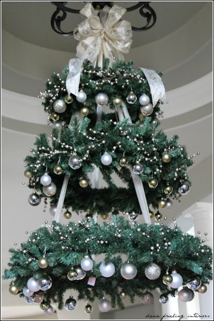 You can hang a wreath like a chandelier. If you combine several of them they'd look like a Christmas tree.