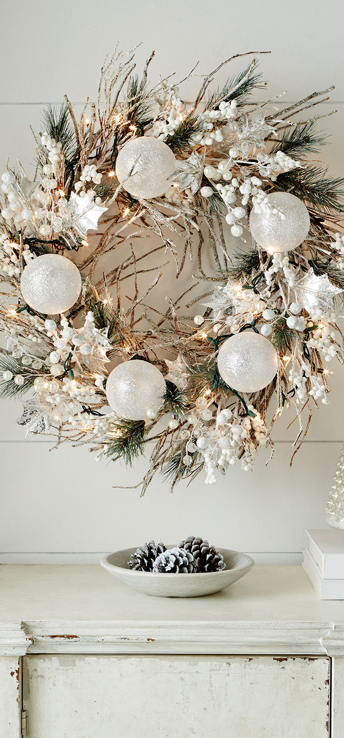 This white Christmas wreath is perfect for those who love Scandinavian decor style.