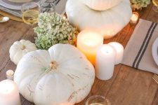 a lovely neutral thanksgiving table setting