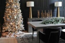 a silver Christmas tree decorated with lights and various silver ornaments is a perfect idea for a winter wonderland space