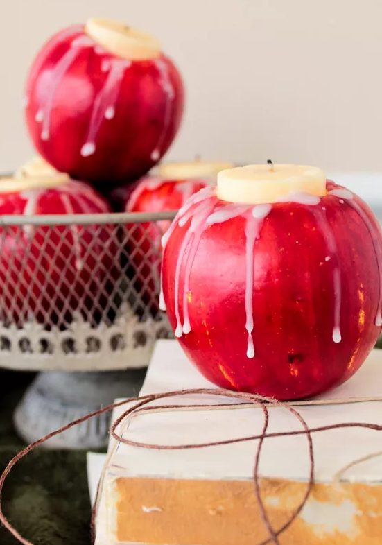 Apples turned into candleholders is a super natural and very fall inspired idea for Thanksgiving or just for the fall