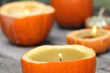cinnamon scented pumpkin candles are perfect for Thanksgiving and they are super natural as decor