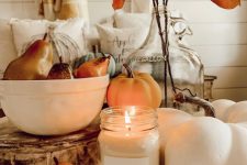 faux veggies, a candle and some dried blooms for beautiful and all-natural fall decor