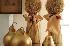gilded pears and wheat bundles with silk bows are adorable rustic decor for fall or Thanksgiving