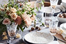 gorgeous silver and gold leaf print plates paired with plain grey ones are fantastic for a modern Thanksgiving tablescape