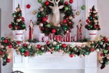 cozy and chic Christmas decor with red and green ornament garlands and a wreath, mini trees and lights, a deer head and red skates