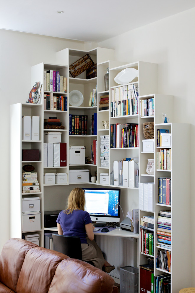 Thanks to contemporary storage systems, even a small home office in a corner of a living room could fit lots of documents and other stuff. (Peter Morris Architects)