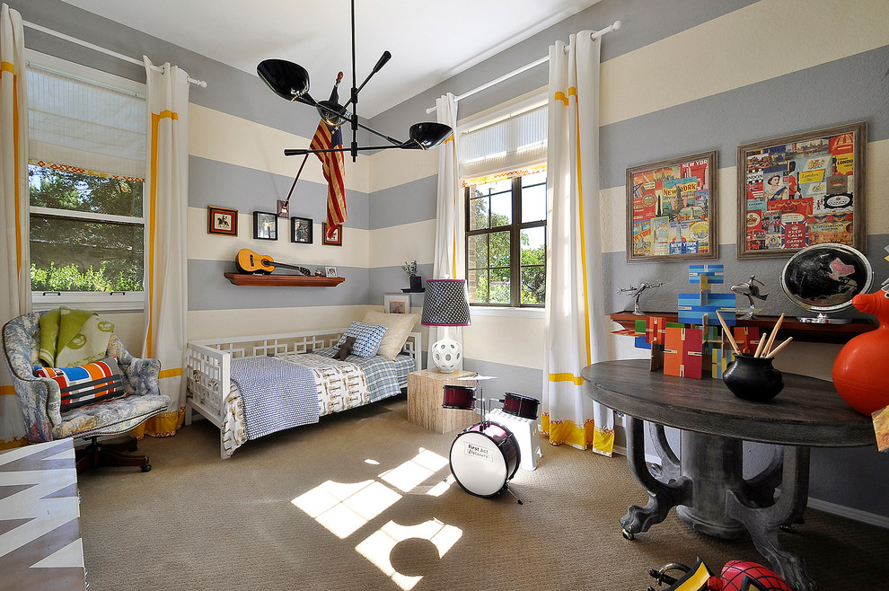 Grayish blue and cream walls provide a very nice background for bright yellow accents in this stylish boys' room.