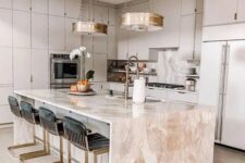 A luxurious kitchen design wit marble touches