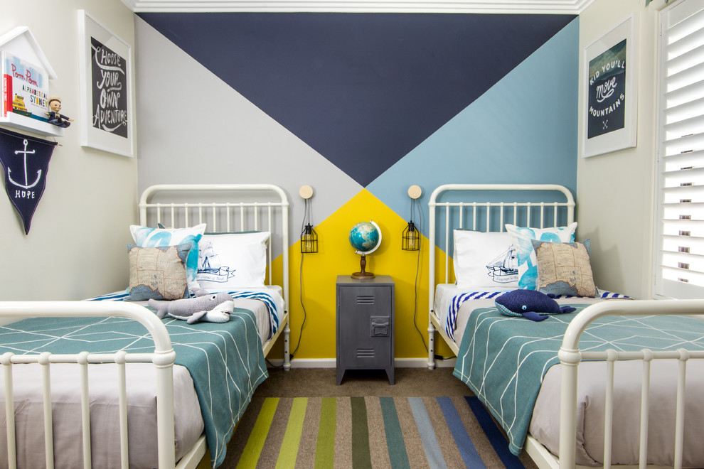 Navy, sky blue and turquoise are used in this space in combination with a bright yellow splash