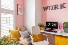 a super bold home office in pink, grey and mustard, with pink walls and a ceiling, with mustard accessories is a unique space