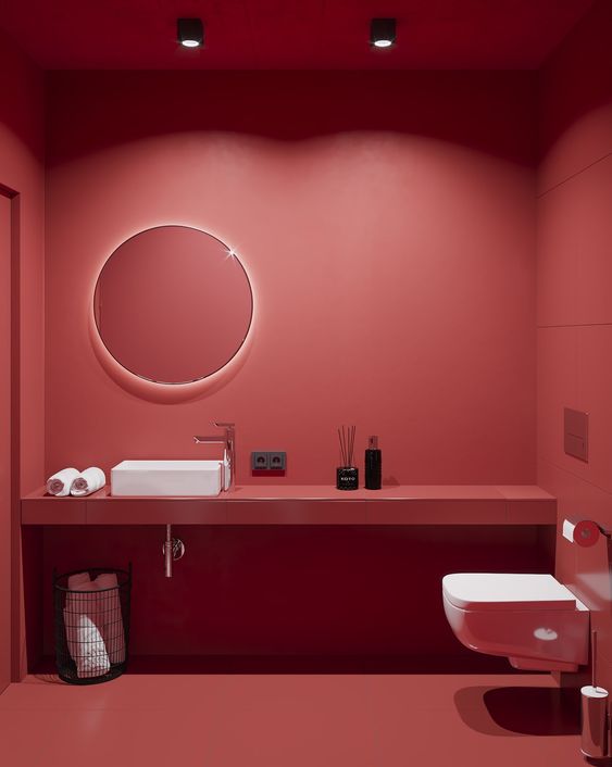 a super bold red powder room design