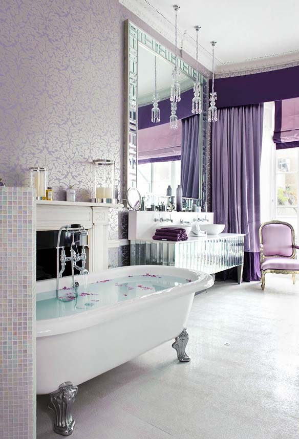 an exquisite bathroom in pastels and neutrals, with purple and lavender curtains, a statement mirror and crystal pendant lamps