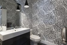 black and white palette need not be boring so use an interesting wallpaper to make your bathroom look fanstastic