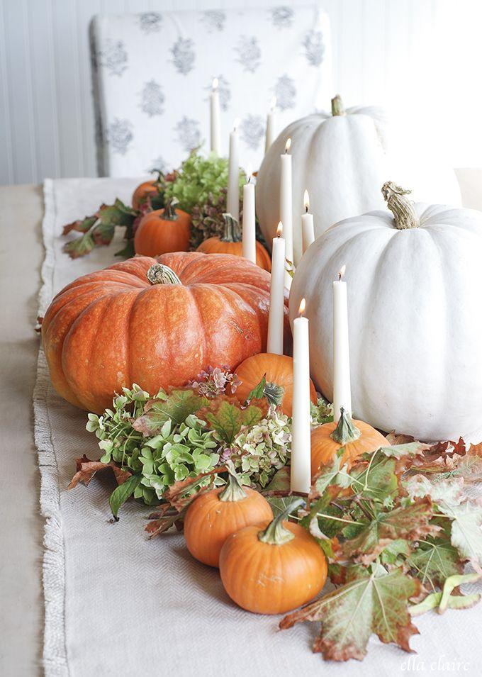 For a more chic look always add pumpkins painted in white and candles to your centerpieces.