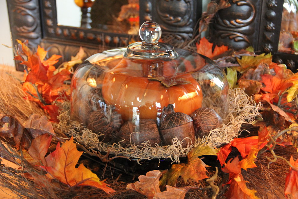 Use your cake stand to make a centerpiece. Fill it with yellow and red leaves, pumpkins, gourds, wooden acorns and any other products of harvest.