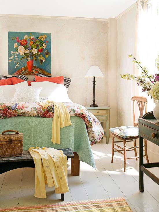 a bright fall bedroom with a neutral base and colorful details in greens, orange, rust and yellows
