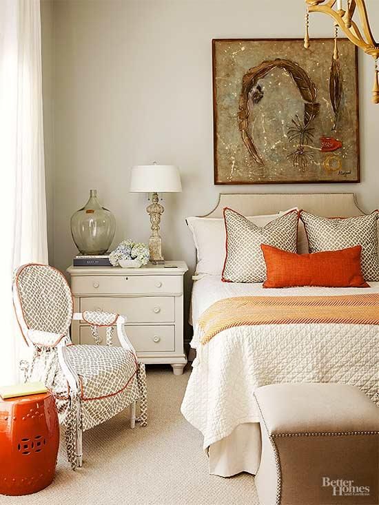 a refined fall bedroom done in creamy, grey, touches of rust and green for a fall feel