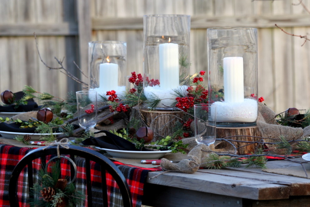 Here is a gorgeous outdoor Christmas table setting that might inspire you to organize something similar if the weather allows.