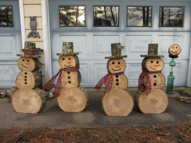 If you're cutting some trees this fall than save some round and make snowmen out of them. Super cool and easy project!